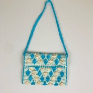 Antonello Tedde blue and white boho textured purse with braided strap.
